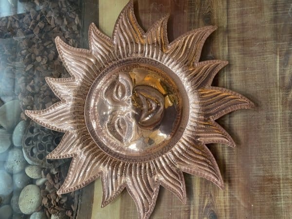 Copper sun hangings etc, medium